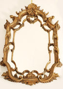 Venetian rococo carved giltwood mirror with shell cresting
