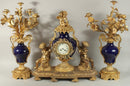 Louis XVI-Style Ormolu and Cobalt Porcelain Three-Piece Clock Garniture