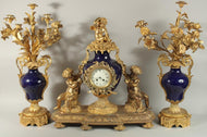 Louis XVI-Style Ormolu and Cobalt Porcelain Three-Piece Clock Garniture