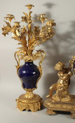 Louis XVI-Style Ormolu and Cobalt Porcelain Three-Piece Clock Garniture