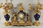 Louis XVI-Style Ormolu and Cobalt Porcelain Three-Piece Clock Garniture
