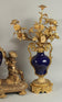 Louis XVI-Style Ormolu and Cobalt Porcelain Three-Piece Clock Garniture