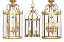 Pair of Gilt Brass Cylindrical Hall Lanterns, together with a Third Lantern